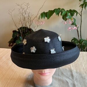 Elegant Black Hat with Floral Embellishments
